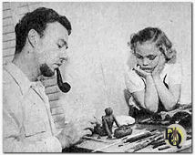 Howard with daughter Pamela showing her some modelling in clay (1947)