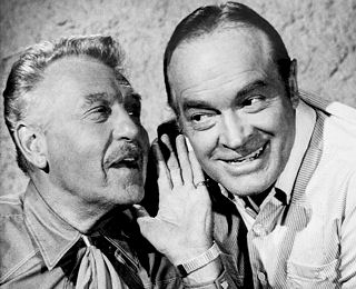 Ralph Bellamy (L), one of America's most respected and enduring actors, shown here with Bob Hope during the filming of "Cancel My Reservation" (1972), the new Warner Bros. release, a mystery comedy in which Bellamy portrays a land baron of the Soutwest.