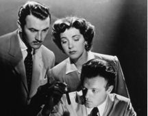 Fred Zinnemann's feature debut "Kid Glove Killer" (1942), a neat, an enjoyable whodunit about the hunt for the killer of the town's crusading mayor. Van Heflin, as the dedicated forensic scientist, demonstrates a mini-dustette to collect evidence from human scalps. Marsha Hunt plays his wisecracking assistant who despairs of his ever realizing that she's a woman, and Lee Bowman as the blandly suave killer. Ava Gardner has a tiny role as a waitress.