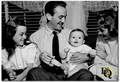  Interior shot in the Westwood Hills bungalow of the Bowmans. From left to right, girl scout Helene has her mother's name, Lee Bowman with Lee Bowman Jr. and Mrs. Helene Bowman (May 1946)