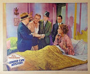 The Spanish Cape Mystery - 1935 lobby card. Scene shows Ellery (Donald Cook), Helen Twelvetrees and the villain being restrained by the cops.