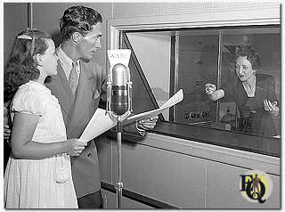  Diana Bourbon directs Carleton Young (Winfield Craig) and Betty Philson in Life Begins (aka Martha Webster) for Radio. (New York, NY. July 1, 1940)