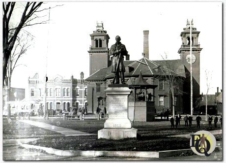 Claremont, NH, has a Square which was round... with five streets hooked up to it. Bandstand and statue included...