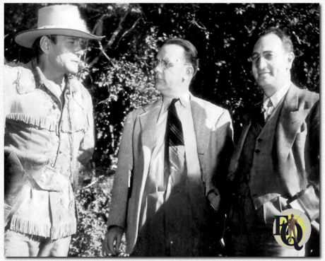(L-R) Lead actor Buck Jones, Columbia Pictures Producer Larry Darmour and Executive Vice-President of Columbia Pictures Abe Montague during the filming of "White Eagle" (Columbia, Jan 31. 1941).