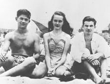 Candid picture George Nader (left) during High School years with friends at the beach.