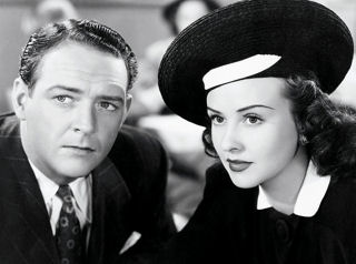 William Gargan with Margaret Lindsay in "A Desperate Chance for Ellery Queen" (1942).