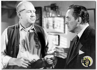 Howard Smith (L) with Fredric March in "Death of a Salesman" (1951).