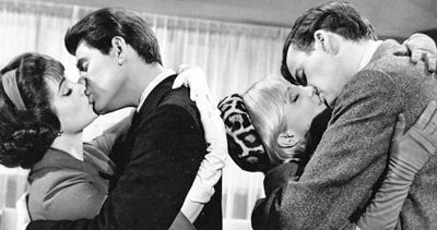 Woman kissing Joby Baker while Susan Oliver and Jim Hutton do the same in "Looking For Love"  (1964).