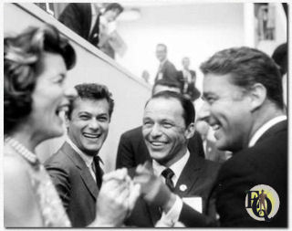 Patricia Kennedy, Tony Curtis, Frank Sinatra and Peter Lawford share a laugh at the Democratic Convention in 1960.