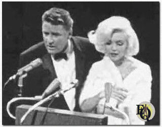 Peter Lawford introducing Marilyn Monroe at Kennedy's Democratic Convention when she sang "Happy Birthday Mister President." (1962)
