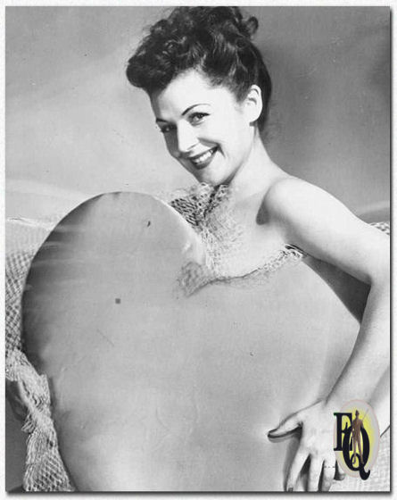 Heart-Throb: Helen Lewis is heard on Mutual's unique "Radio Auction Show," Wednesdays (10:00 to 10:30 PM EST). The articles auctioned by Dave Elman on February 13. will bear the romantic flavor of Valentine's Day. (Feb 12. 1946)
