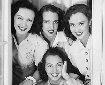 In 1941, for the first time in seven years, Margaret Lindsay was reunited with three sisters. The girls, natives of Dubuque, Iowa, are L to R; (standing) Mrs.John Page Bueheler, wife of a USA officer stationed at the Panama Canal; Mrs. Fredrick C. Keuline of Chicago; Miss Lindsay and Mary Kies, youngest daughter.