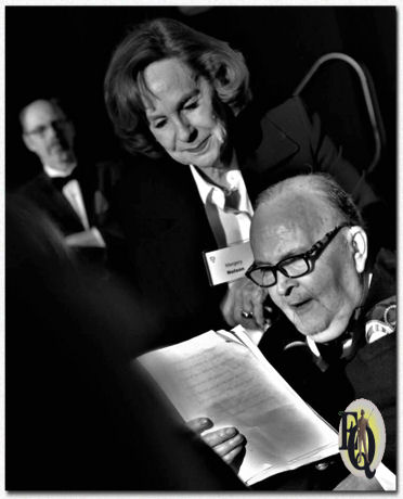 Bill, aided by Margery Nelson, made an excellent acceptance speech (glorious photo by Peter Rozovsky). Click on the photo to hear the full speech.
