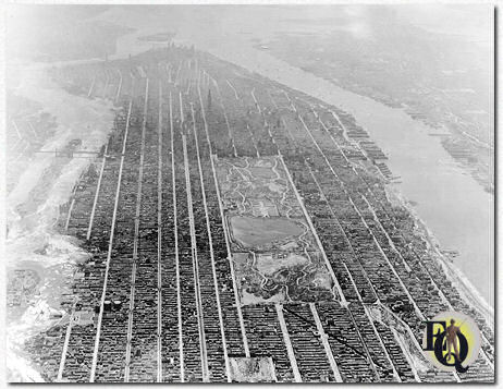 Nowadays we tend to think of Manhattan as a place packed with skyscrapers from the Bronx to the Battery... this wasn't the case when Ellery Queen started writing. Aerial photo of Manhattan in 1931.