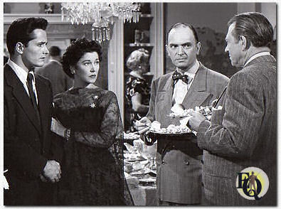 John Derek, Erin O'Brien-Moore, Santos Ortega, Carl Benton Reid in the film "The Family Secret" (1951).