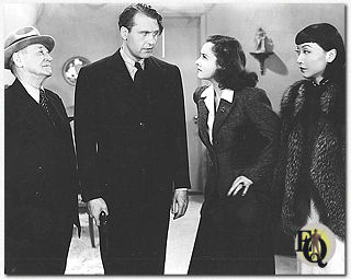 From left to right: Grapewin, Ralph Bellamy (Ellery Queen), Margaret Lindsay (Nikki Porter) and Anna May Wong in "Ellery Queen and The Penthouse Murder" (1941).