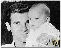 Candid photo of Lee Philips showing his daughter Julie (ca.1960).