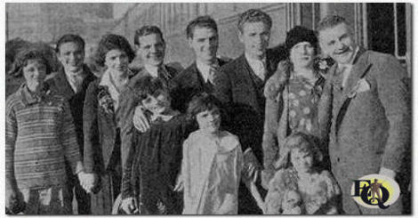  Joseph Quillan (1884-1952) and Sarah (1885-1969) with their nine children (Eddie is the fourth from the left)