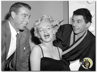 Joe DiMaggio and Marilyn Monroe pay a backstage visit (1954) to David Wayne during a performance of "The Teahouse of the August Moon" (Martin Beck Theatre, Oct 15. 1953 - Mar 24. 1956).