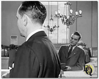 Detail from the film "The Best Years of Our Lives" (RKO Radio Pictures, Nov. 21. 1946) in which Dobkin played a customer wearing a hat in the bank.