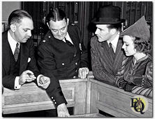 Hugh Marlowe and Marion Shockley pay a visit to the New York City Police Headquarters. (New York, September 13. 1936, CBS)