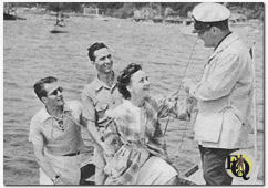 Nikki and Ellery are as attractive in real life as they are on the air. Leaving the skiff for Mark Warnow's yawl are, left to right, Ellery Queen, radio's supersleuth, in real life, Hugh Marlowe; George Zachary, producer and director; Nikki Porter (Marion Shockley); Warnow is on deck. - ED (Picture by Walter Seigal) (from "Radio Guide" 40-01-05).
