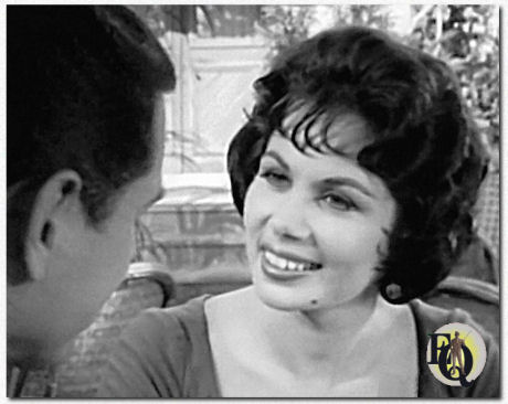 Photo from the "Peter Gunn" series with Craig Stevens and Nina Roman ("Criss Cross", NBC, Sep 28. 1958)