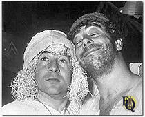 Sugar Lips Shapiro (Harvey Lembeck) and Animal (Robert Strauss) laughing their way through the war in "Stalag 17" (1953).