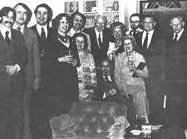 Part of the group who gathered at a reception in President's Cramer's home after the ceremony. Around Fred, seated, with his wife Rose at his left, are from left to right: Steve Stilwell, Al Hubin, Mike Nevins, Marilyn Hubin, Don and Marge Pendleton, Ned and Cathy Guymon, Randy Cox, Bob Fish and John Ball.